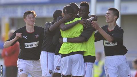 Brentford players celebrate Herson Rodrigues Alves' goal in the win over Liverpool