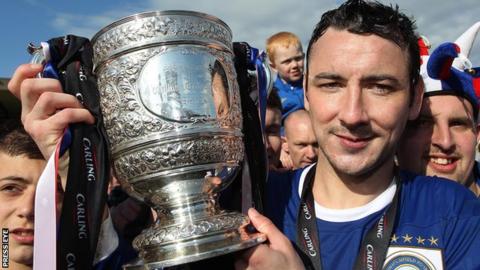 Michael Gault with the league trophy