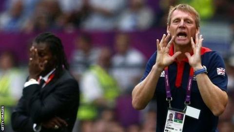 Britain's coach Stuart Pearce (right) shouts instructions