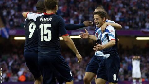 Joe Allen (right) and Aaron Ramsey celebrate Daniel Sturridge's goal