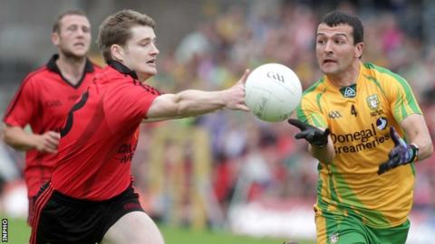 Down's Conor Maginn and Donegal's Frank McGlynn battle for possession in last month's Ulster Final