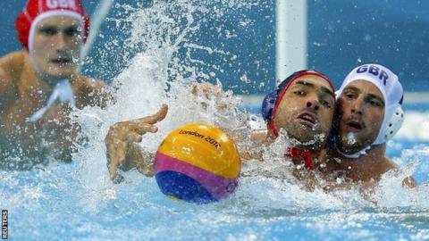 Ryan Bailey (C) of the US is challenged by Britain's Alex Parsonage
