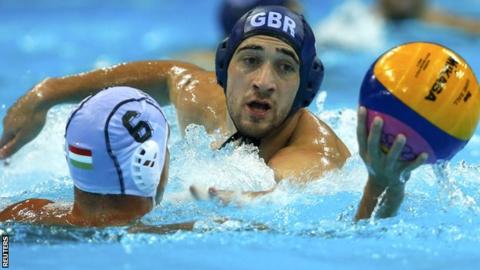 Britain's Ciaran James challenges for the ball
