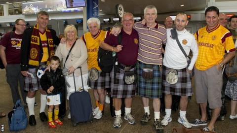 Motherwell fans gather at Glasgow Airport