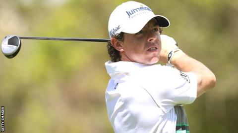 McIlroy hits a shot during practice for the US PGA