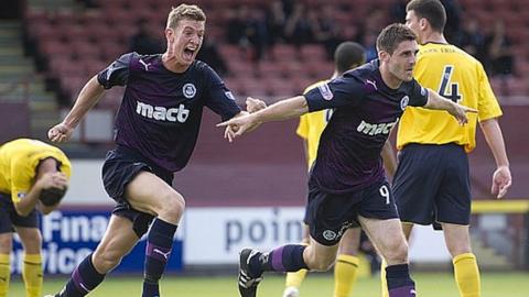 Kris Doolan (right) scored two of Partick Thistle's goals