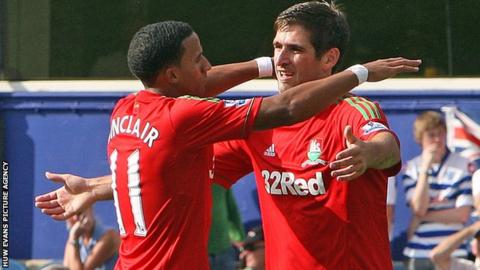 Scott Sinclair celebrates his goal against QPR with Danny Graham