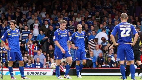 Cardiff City players dejected after losing to Bristol City
