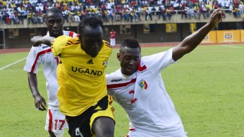 Brian Umony (centre) is out of Uganda's match against Zambia