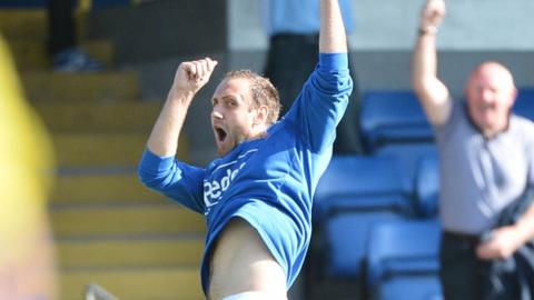 Guy Bates celebrates after his goal against Crusaders