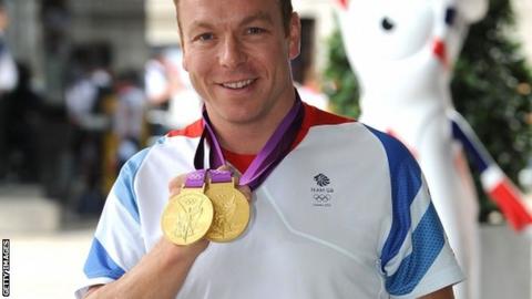 Sir Chris Hoy with his two gold medals