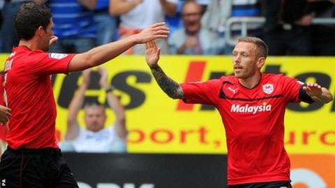 Craig Bellamy celebrates after scoring against Leeds United