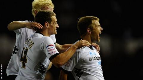 Jamie Ward (right) celebrates scoring for Derby