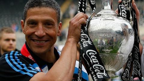 Chris Hughton with Championship trophy