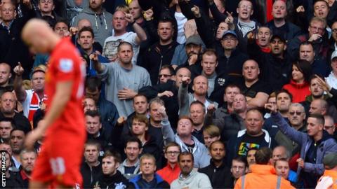 Liverpool's Jonjo Shelvey is sent off after a tackle on Manchester United's Jonny Evans