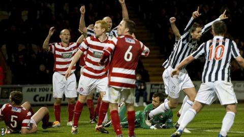 St Mirren celebrate after their winner through Lee Mair (second right)