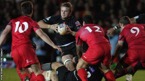 Dragons' Lewis Evans charges forward against Edinburgh