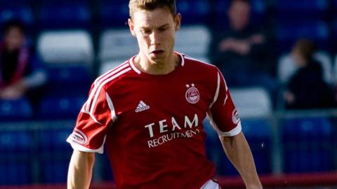 Megginson in one of only two appearances this season for Aberdeen