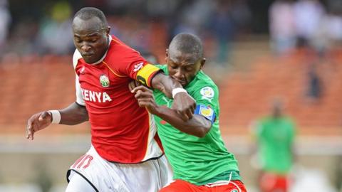 Denis Oliech of Kenya (left)