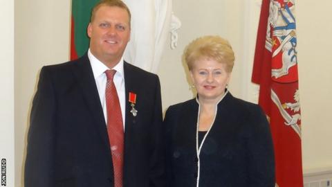Jon Rudd (left) and Lithuanian President Dalia Grybauskaite
