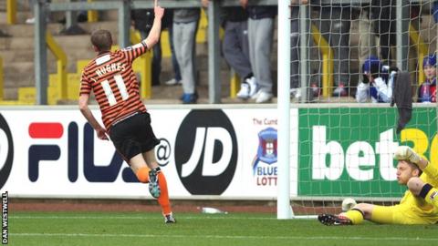 Jeff Hughes celebrates
