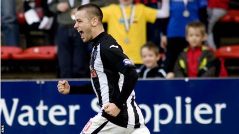 Wallace celebrates his equaliser for Dunfermline
