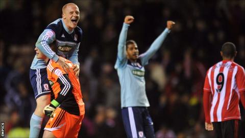 Middlesbrough players celebrate on the final whistle