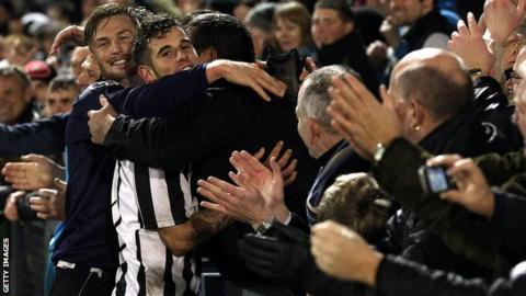 Former Plymouth youngster Jake Gosling celebrates scoring Dorchester's winner