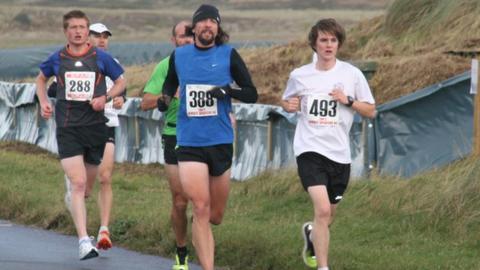 Elliott Dorey leads the race