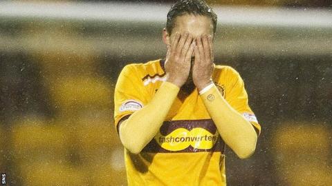 Motherwell's Tom Hateley hangs his head after losing out to Dundee Utd by a single goal
