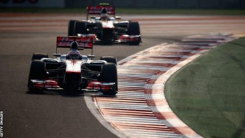 Jenson Button (front) and Lewis Hamilton