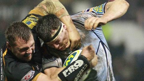 Robin Copeland is tackled by Wasps' Tinus Du Plessis