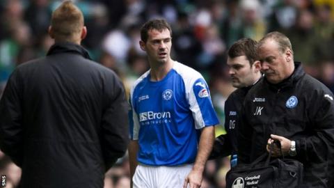McCracken leaves the field at Celtic Park
