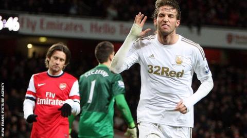 Michu celebrates his second goal against Arsenal