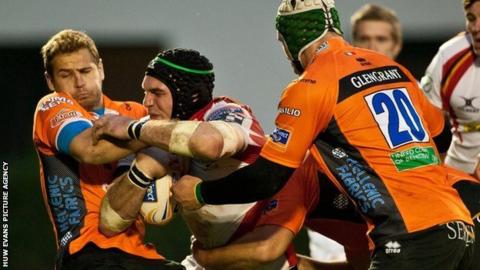 Newport Gwent Dragons' lock Robert Sidoli runs into heavy traffic as his side are beaten 32-13 by Treviso in the Rabo Direct Pro 12 league match on Saturday.