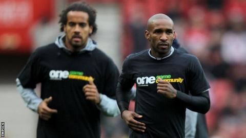 Tom Huddlestone and Jermain Defoe