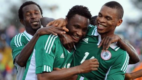Nigeria celebrate during their victory over Liberia