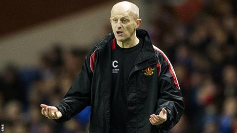 Harry Cairney urges his side on at Ibrox against Rangers