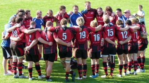 Jersey team huddle