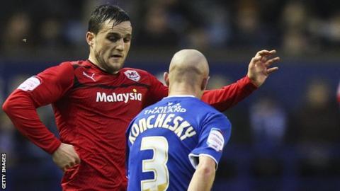 Craig Conway takes on Leicester's Paul Konchesky