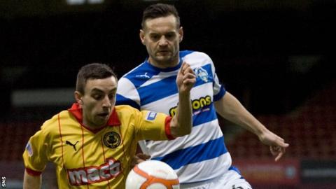 Steven Lawless shields the ball from Morton's Mark McLaughlin