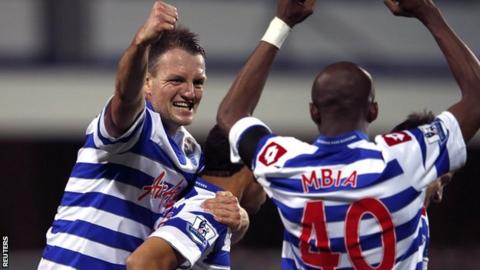 Clint Hill (left) celebrates the win over Fulham