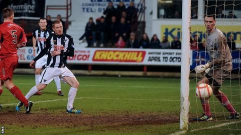 Andrew Geggan scores for Dunfermline against Raith Rovers