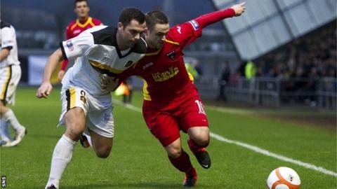 Dumbarton's Chris Turner vies for possession with Ryan Wallace