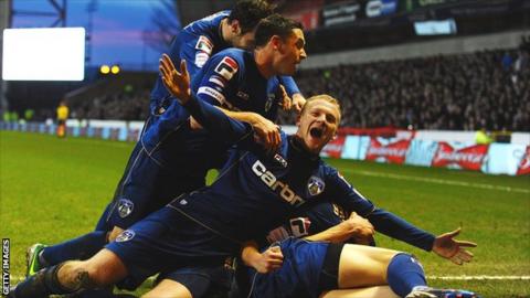 Oldham celebrate a goal during their FA Cup victory at Nottingham Forest