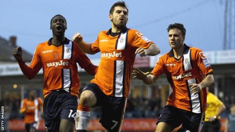 Luton's Alex Lawless celebrates his winning goal against Wolves