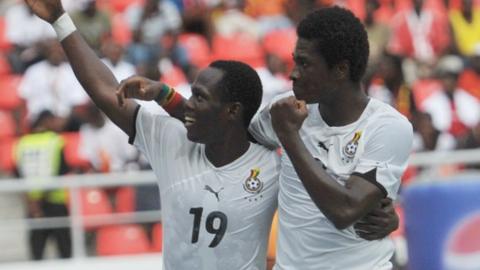Ghana's Emmanuel Agyemang-Badu and Asamoah Gyan (right)
