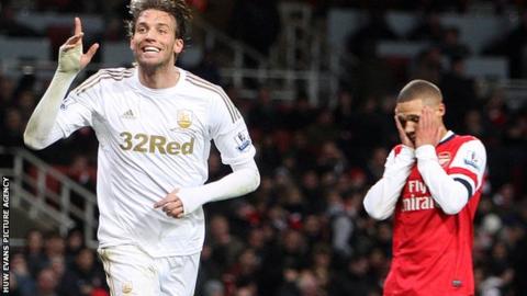 Michu scoring in Swansea City's 2-0 win at Arsenal