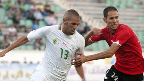 Islam Slimani (left)