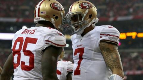 Vernon Davis #85 and Colin Kaepernick #7 of the San Francisco 49ers